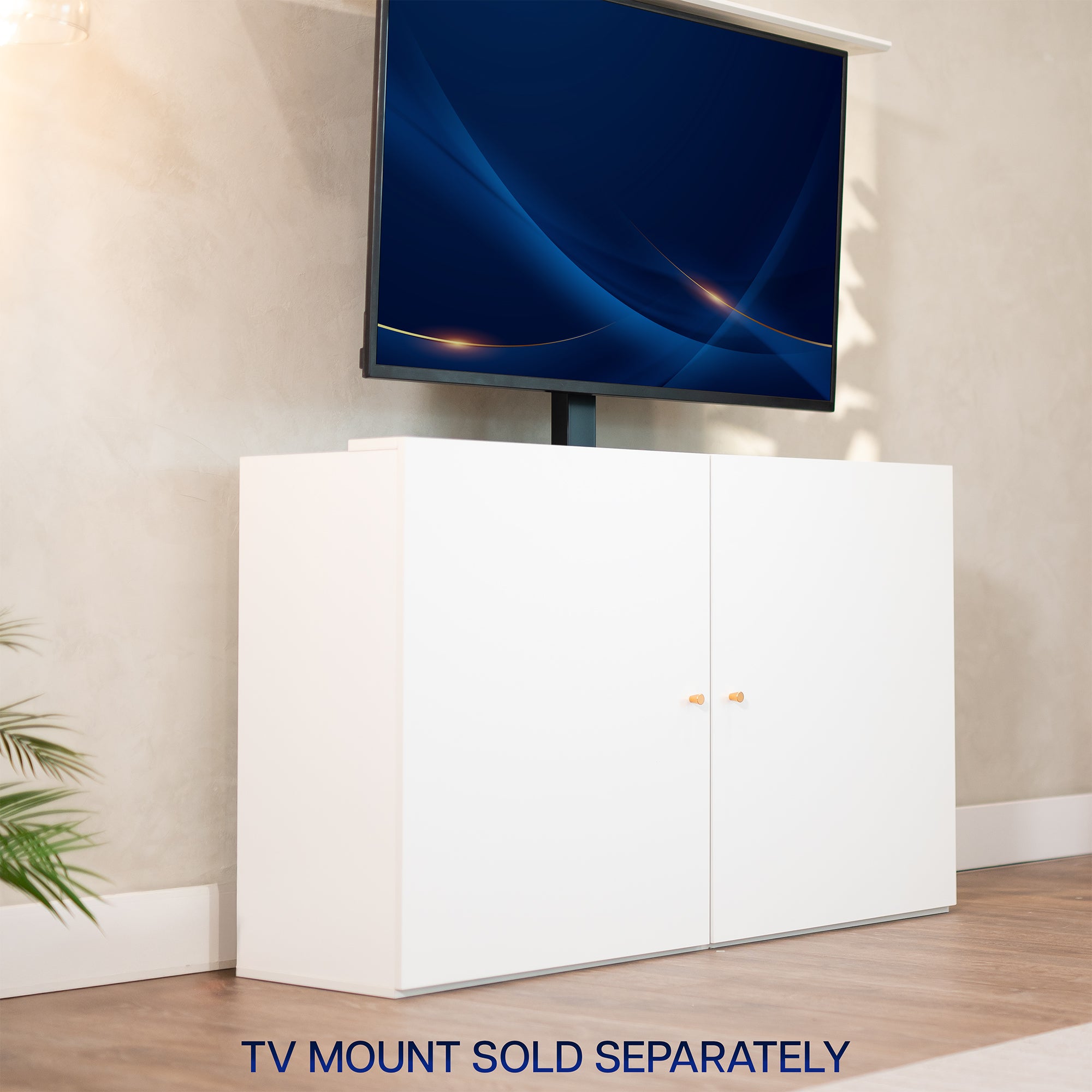 White cabinet concealing a TV in a living room space.