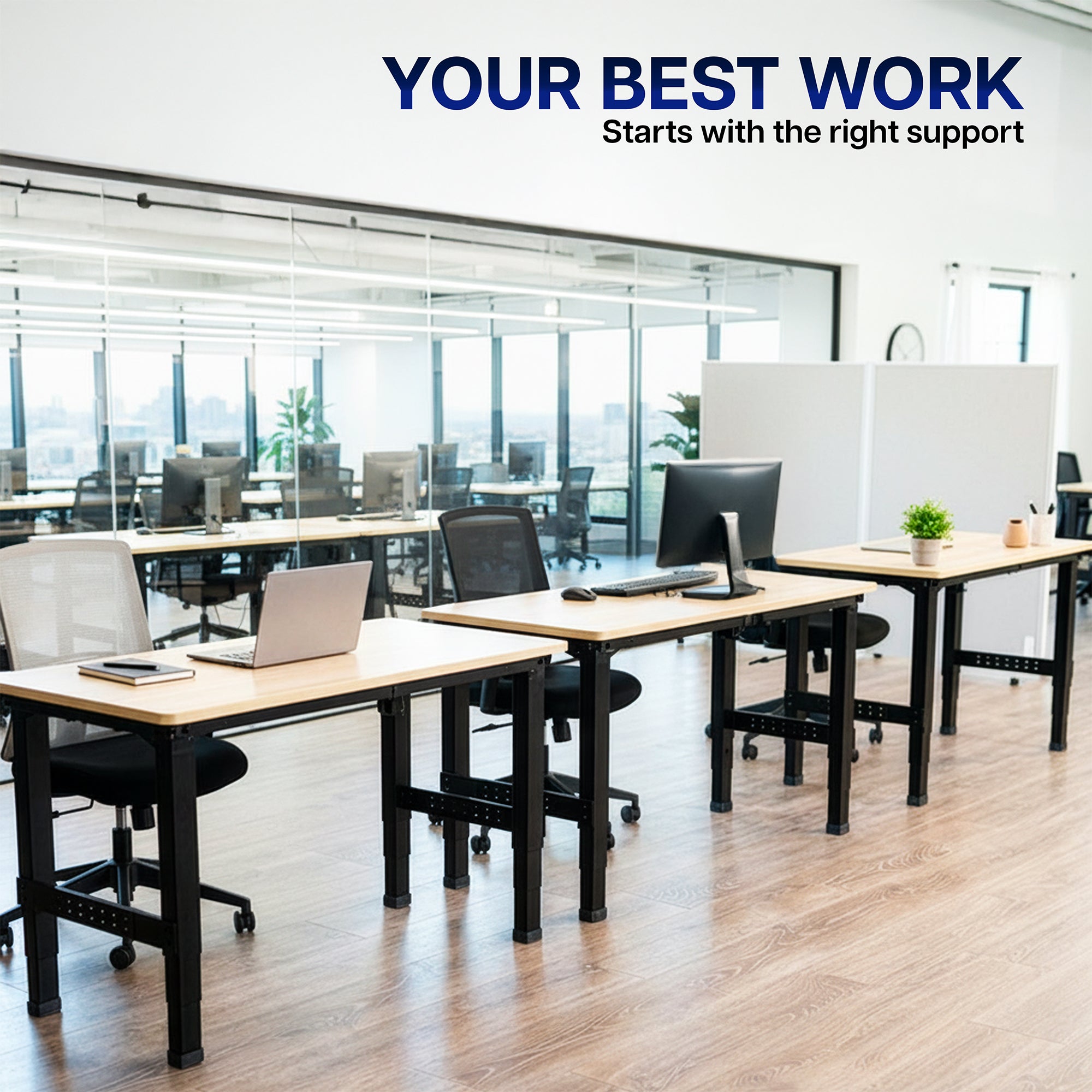 An office with three side by side Black Premium Electric Dual-Motor Height Adjustable 4-Leg Desk Frame