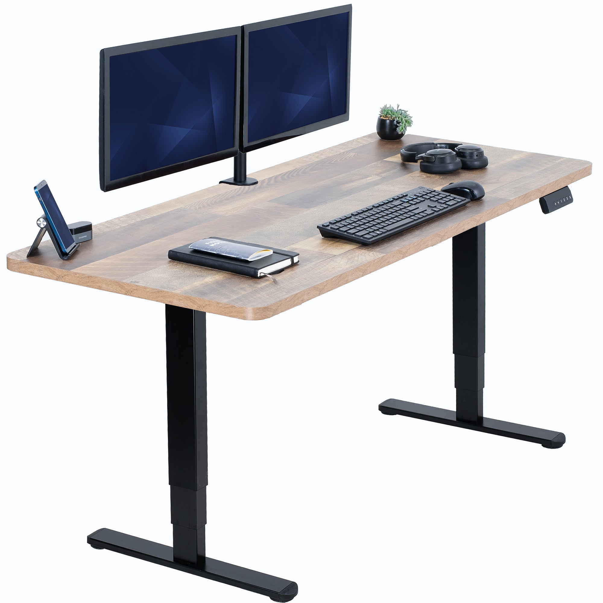 Wooden desk with black legs, two monitors, keyboard, and other office items on a white background