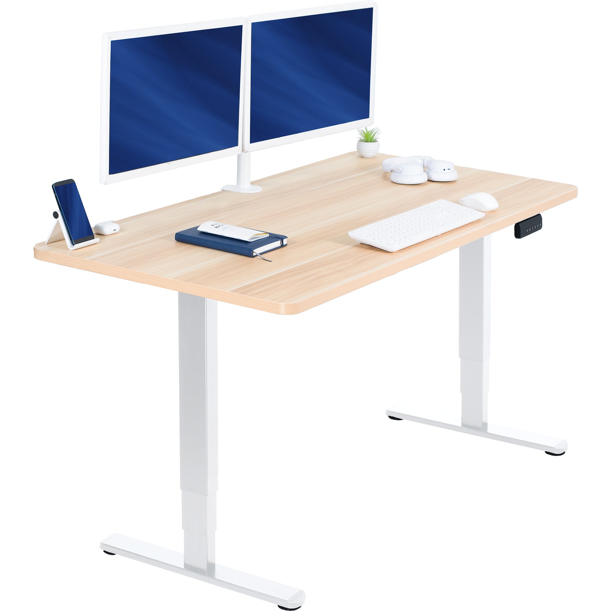 Wooden desk with white legs, two computer monitors, a phone, and other office items on a white background.