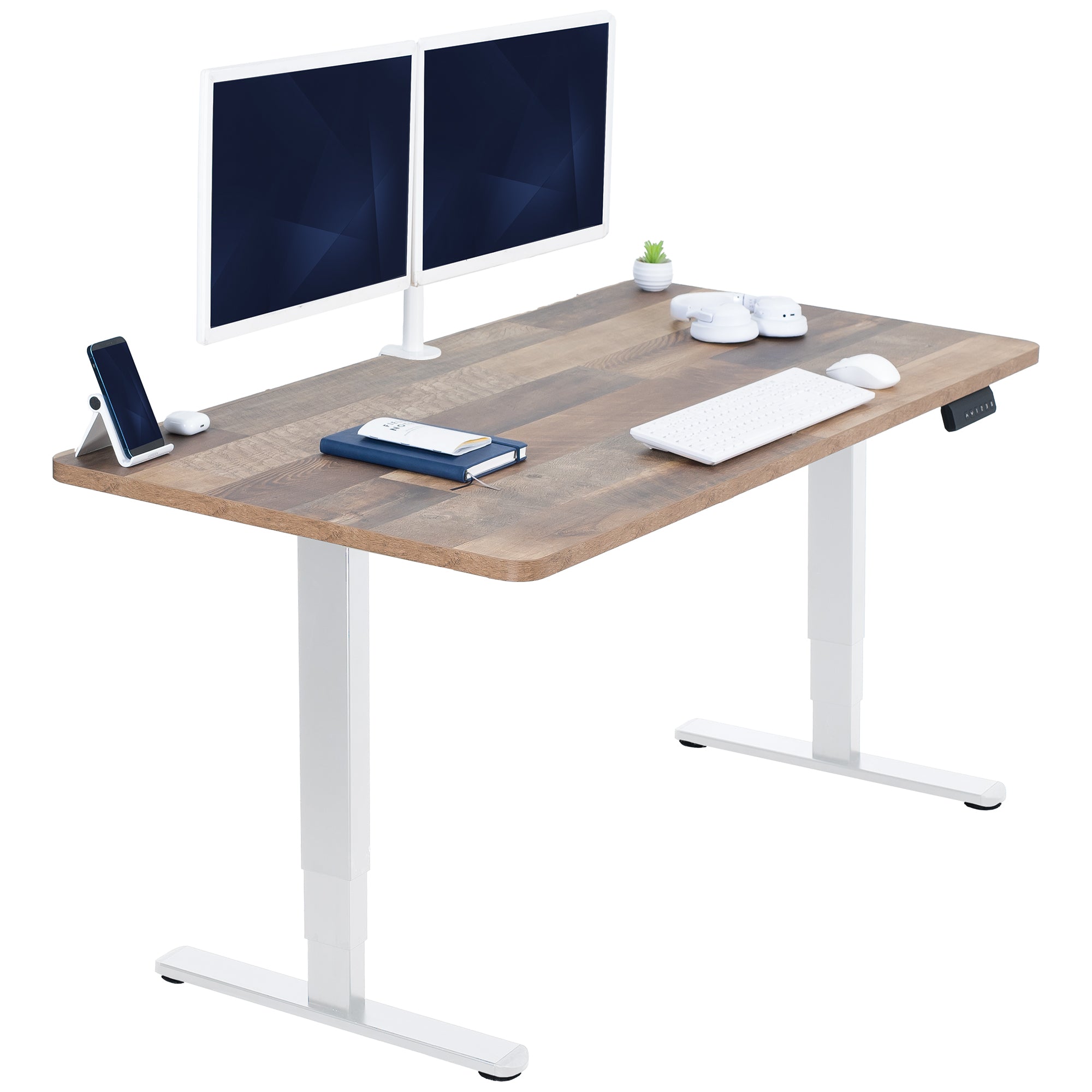Wooden desk with white legs, two computer monitors, a phone, and other office items on a white background.
