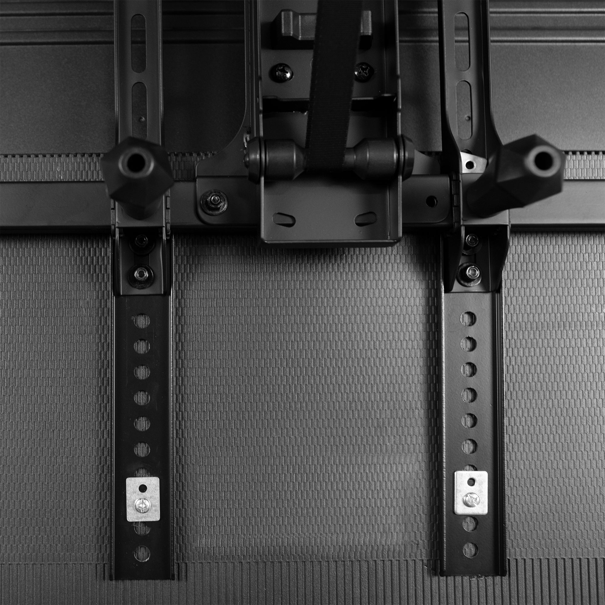 Vertical overhead VESA plate extender brackets.