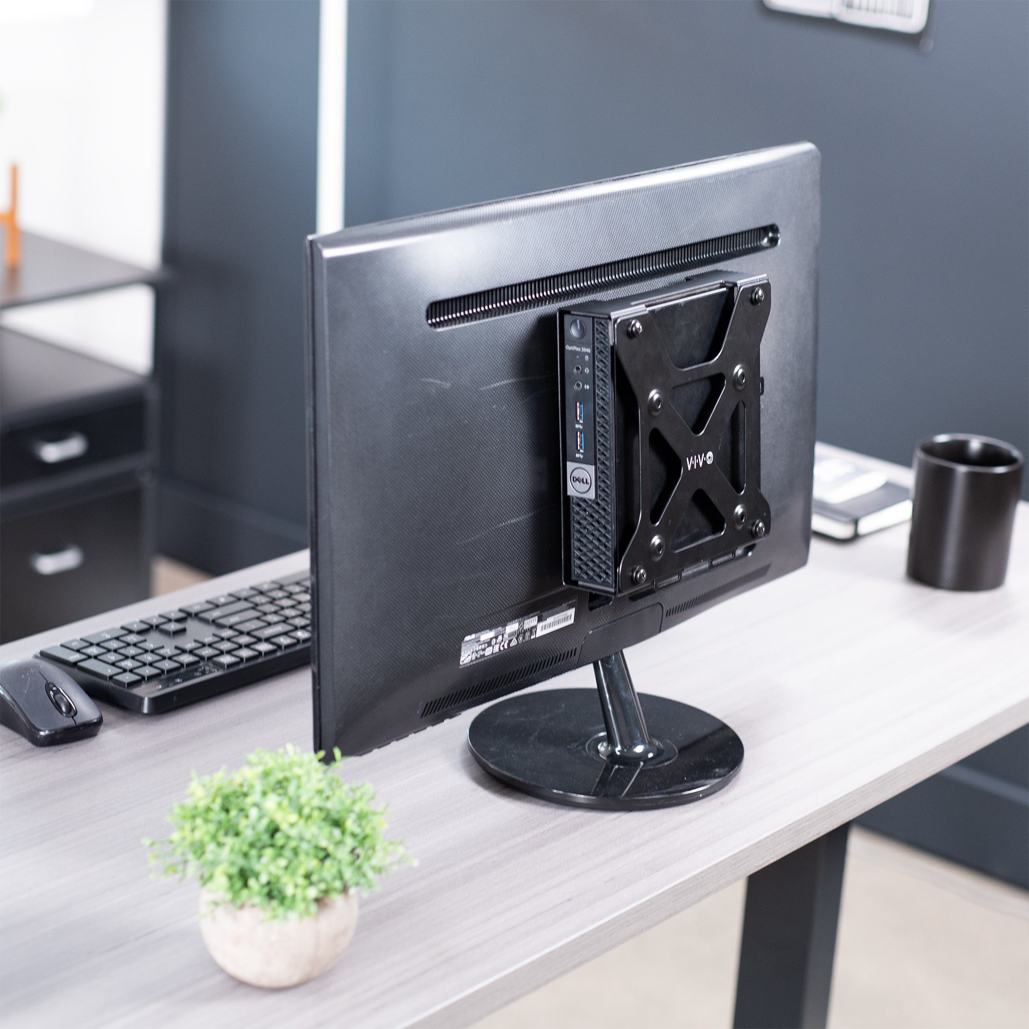 Mount Designed for Dell OptiPlex Micro mounted on back of freestanding monitor.