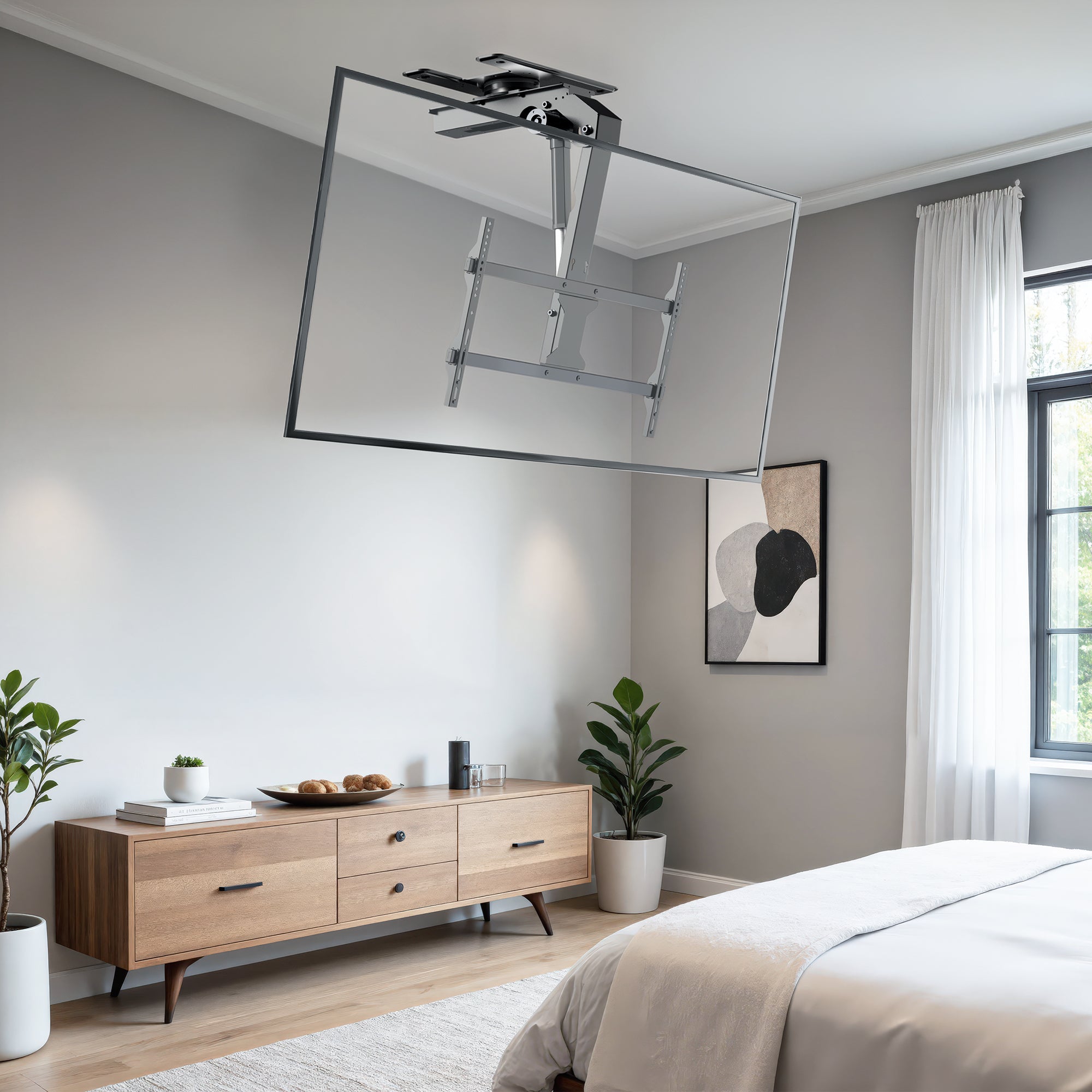 Modern bedroom with wooden dresser, bed, and ceiling-mounted TV