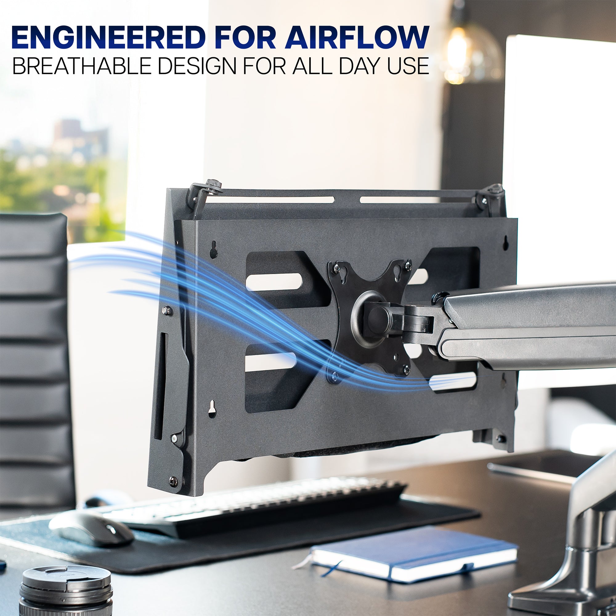 VIVO mount attached to monitor arm in upright position demonstrating the airflow capabilities and engineering behind the design