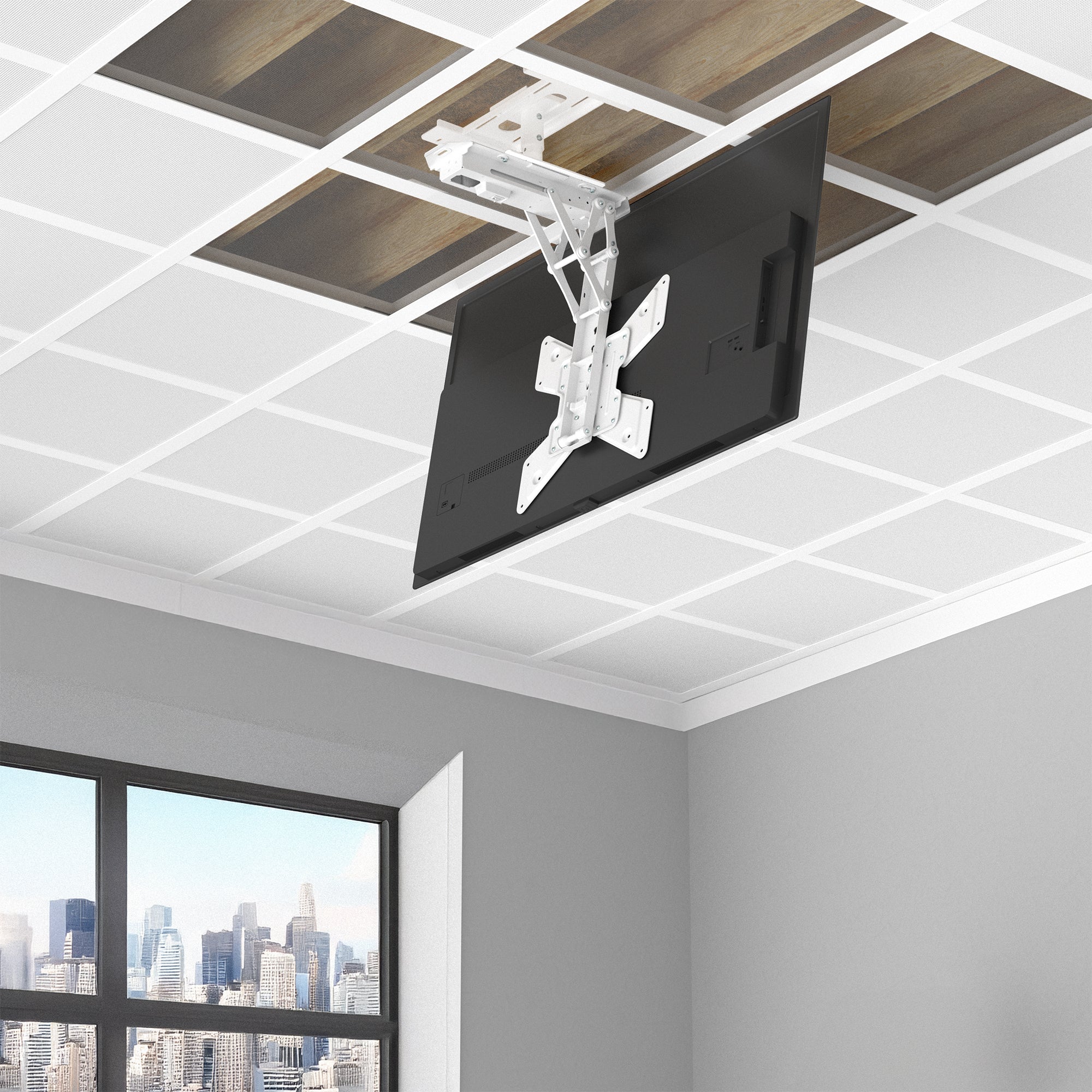 Ceiling-mounted TV bracket in an office setting with a cityscape view.