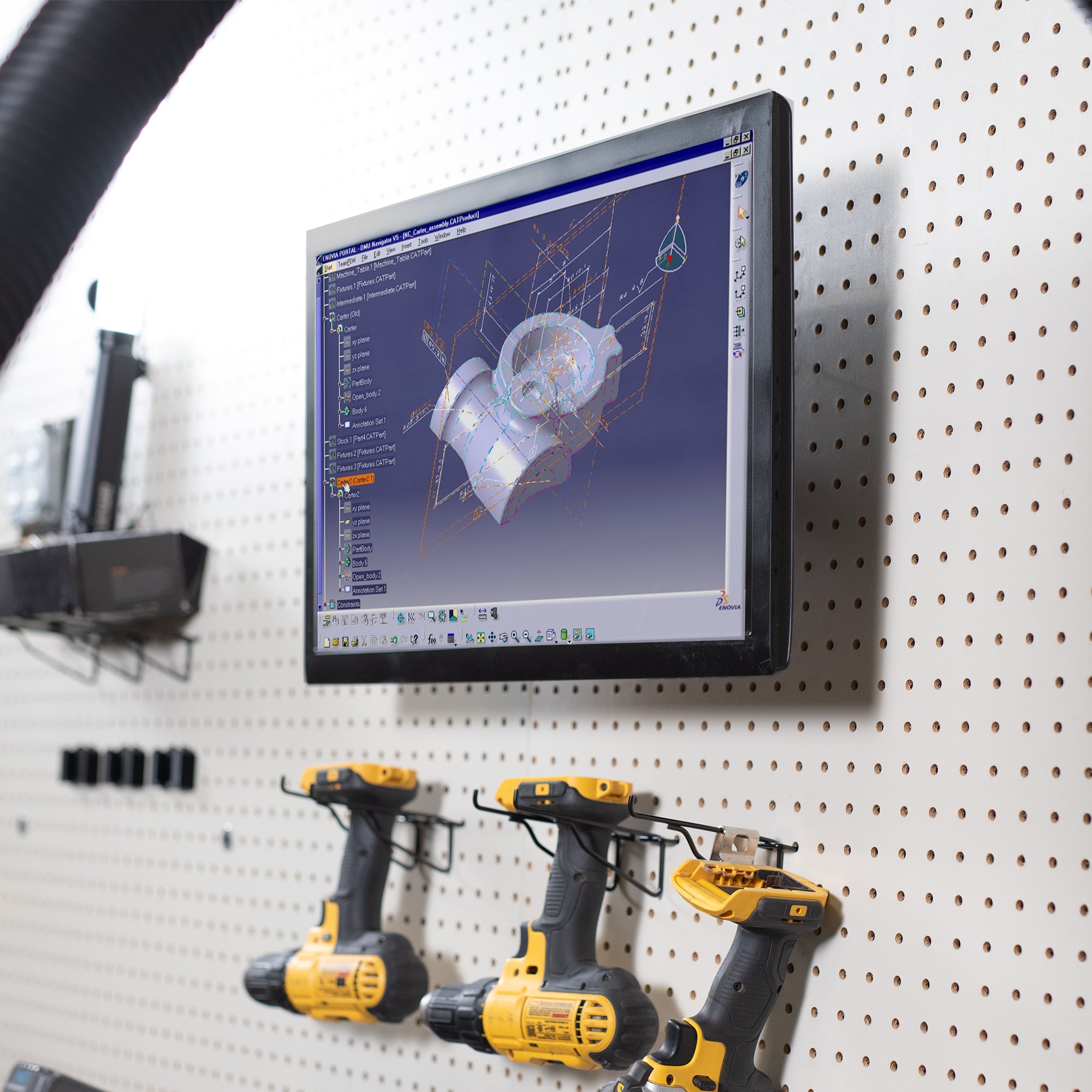 Pegboard mounted single monitor mount with tilt, swivel, and rotation.