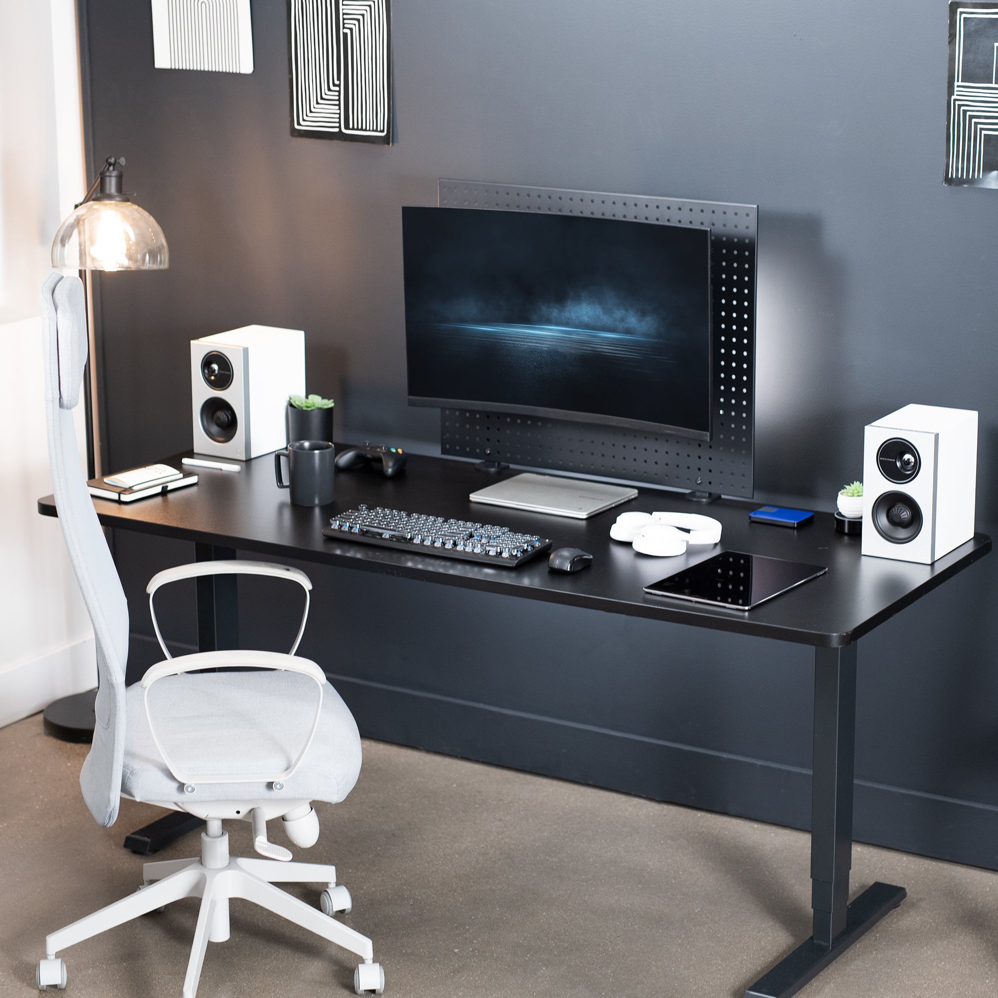 Pegboard mounted single monitor mount with tilt, swivel, and rotation.