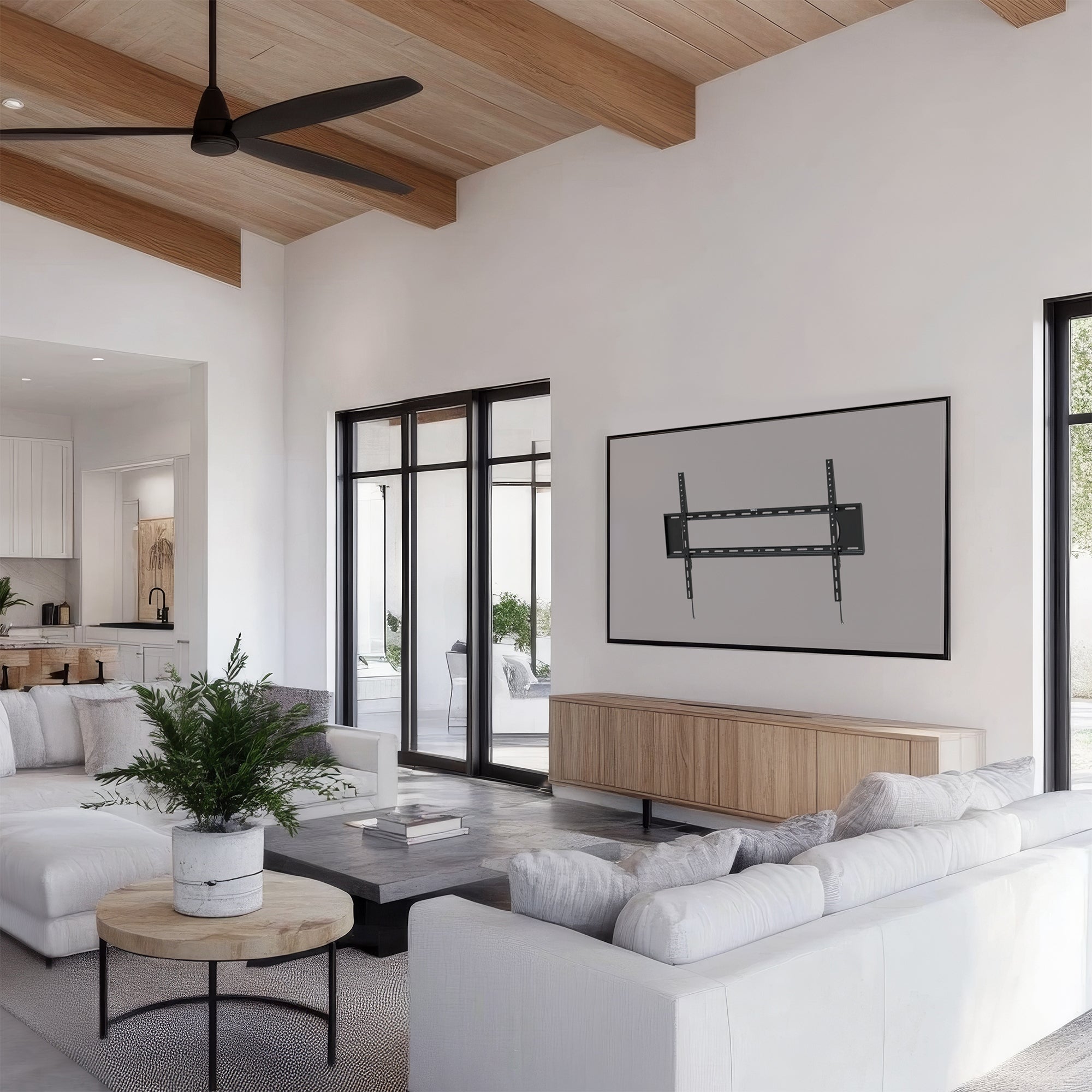 Extra large TV mount from VIVO in living room setting.