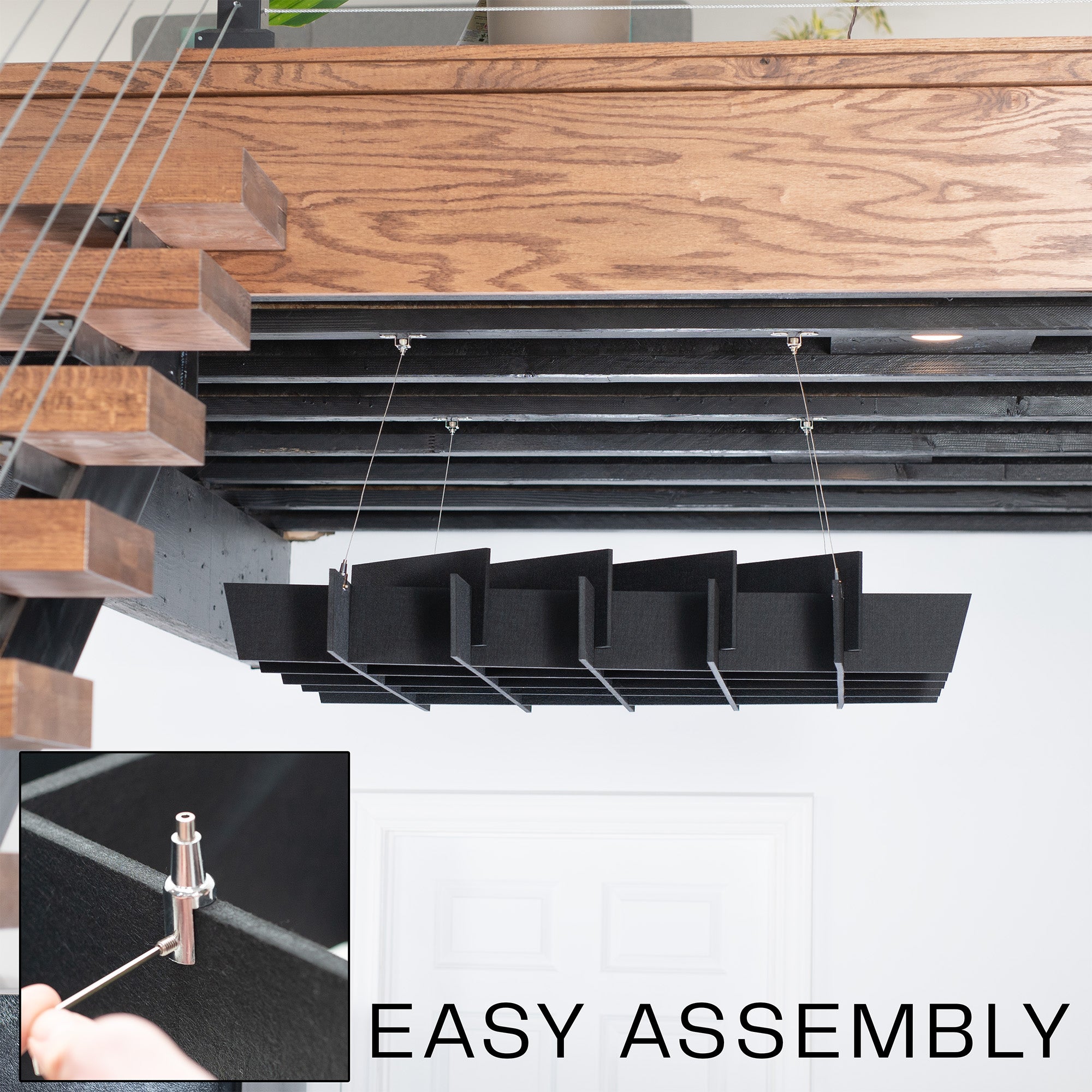 A black acoustic dual-layer ceiling waffle panel with a geometric pattern, mounted on a ceiling.