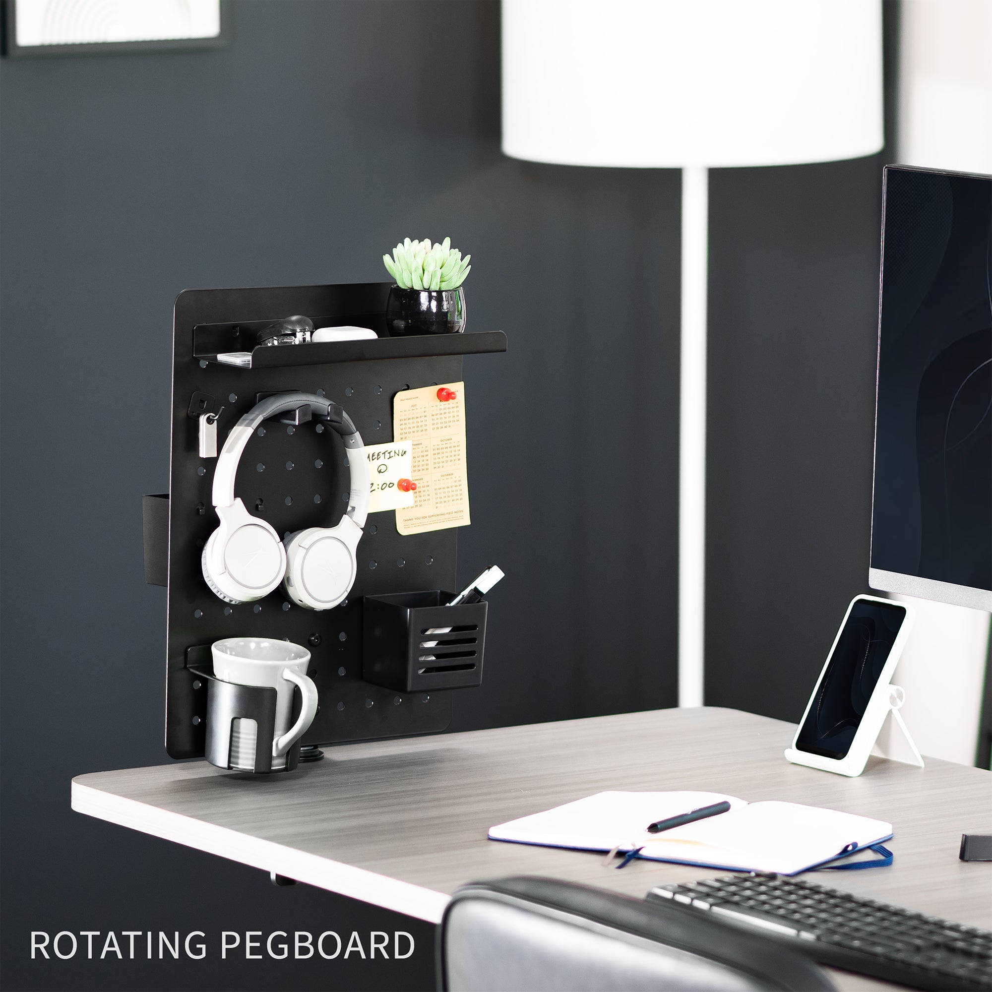 Clamp-on 360-degree rotating pegboard for storage and privacy with accessories included. Double-sided organization panel featuring above or below desk installation and an easy assembly process.