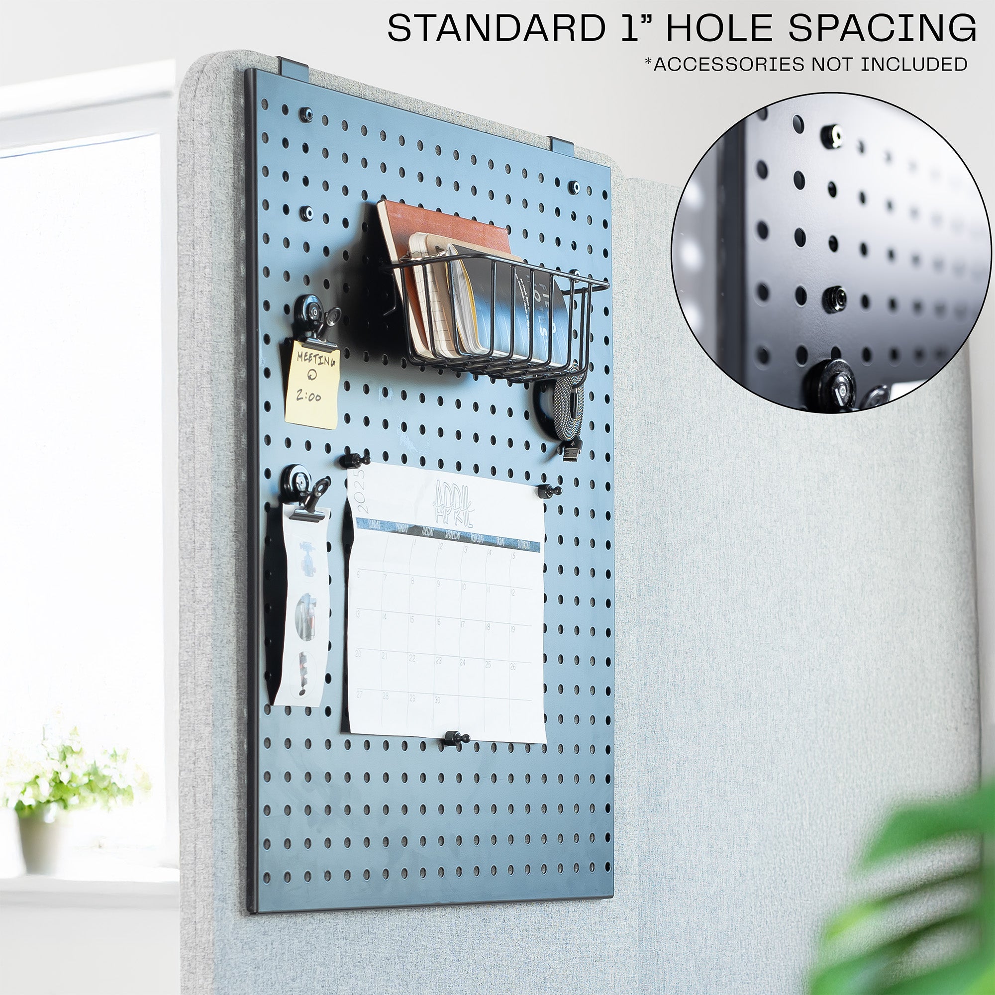 A black pegboard with 1" hole spacing.