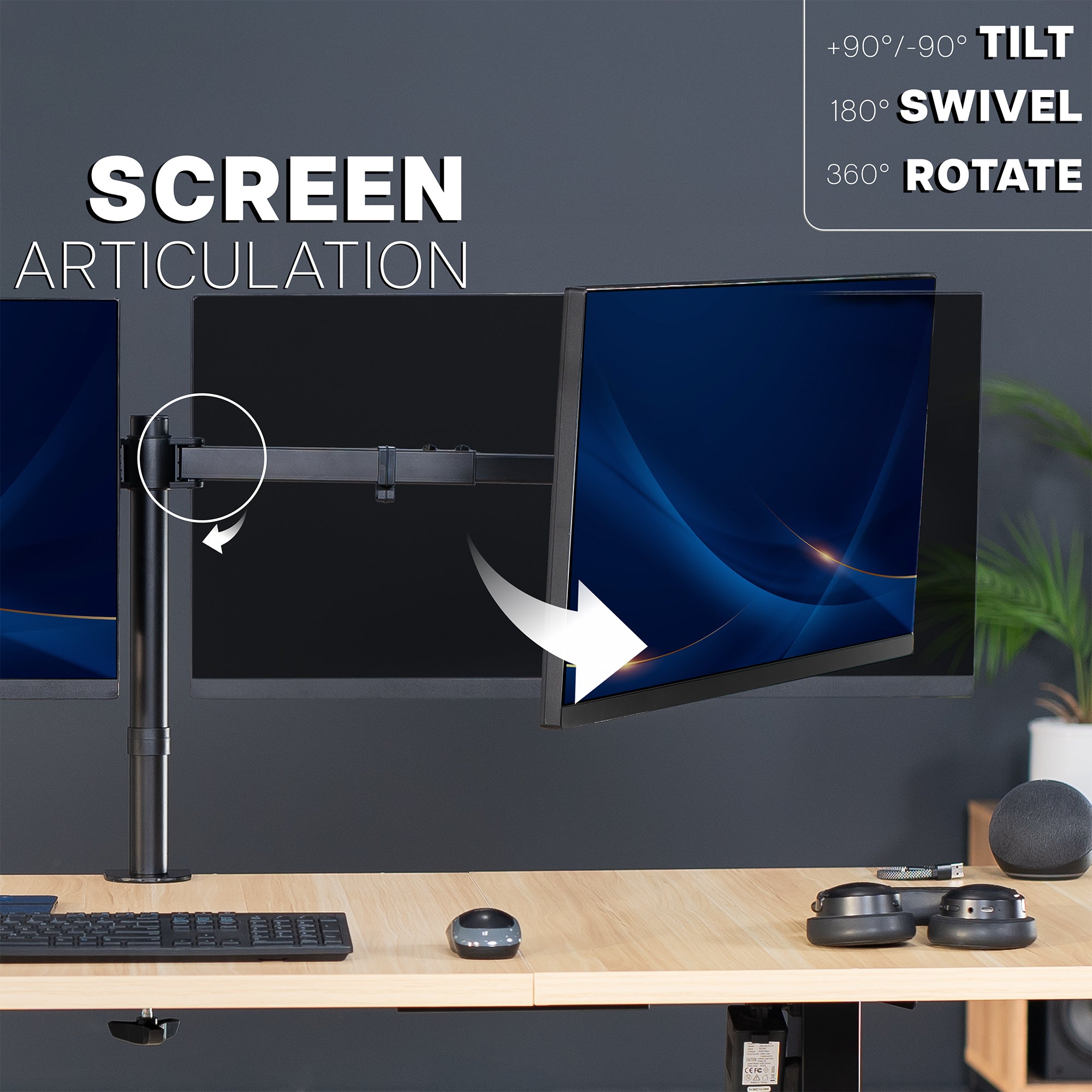 Computer monitor on a stand with articulation features highlighted, on a desk with keyboard and mouse.