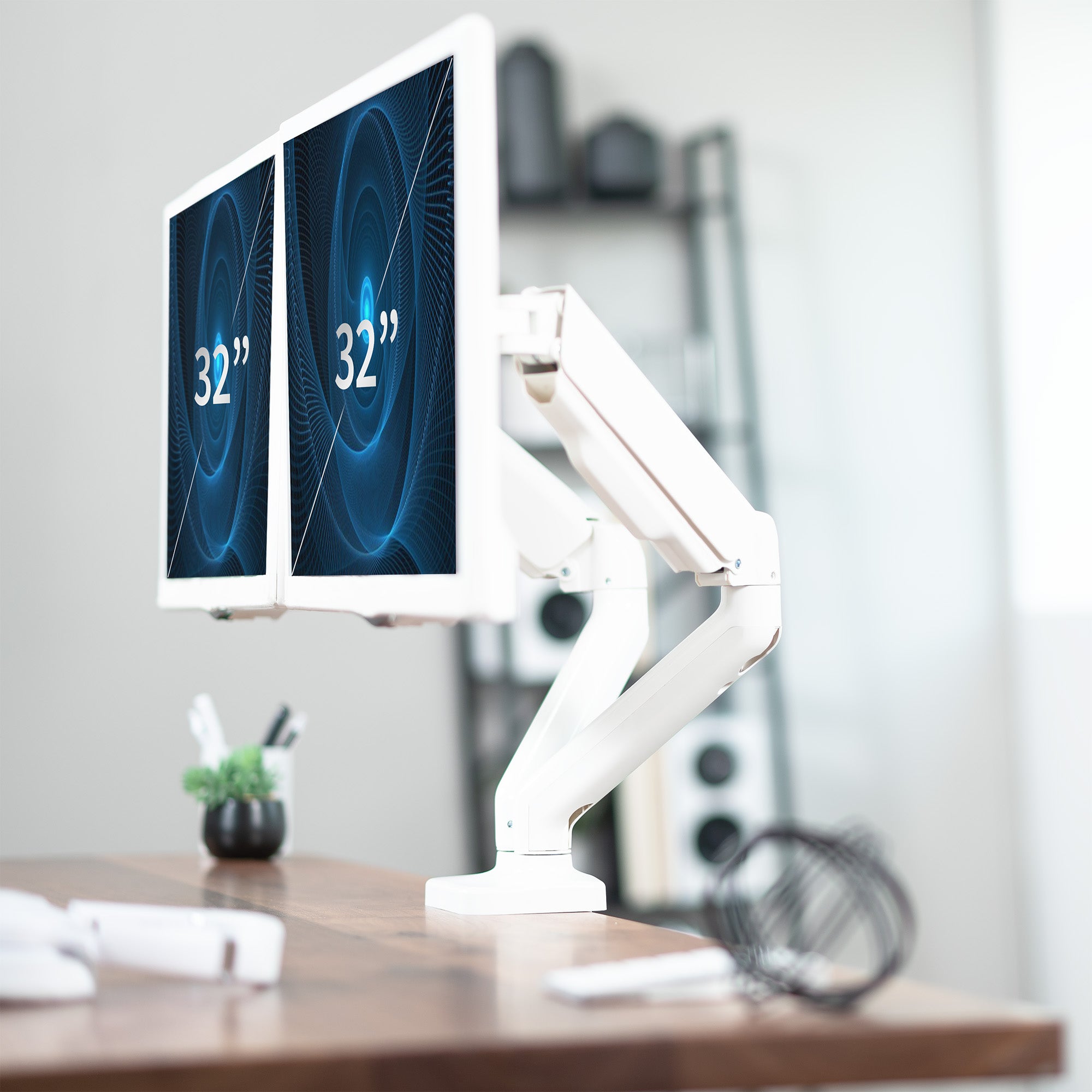 Sturdy adjustable mechanical arm dual monitor ergonomic desk stand for office workstation.