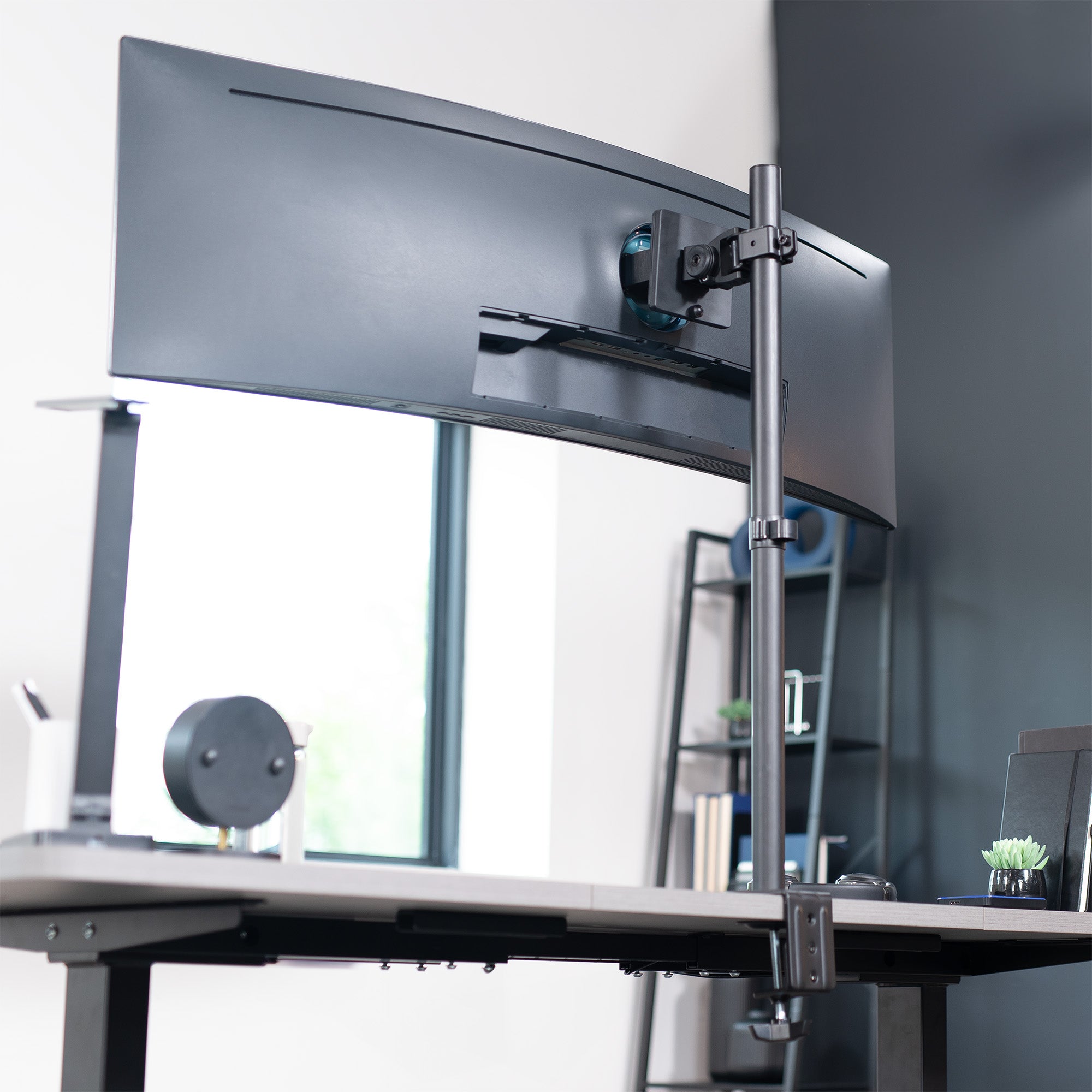 Clamp-on single monitor ultrawide desk mount with height adjustment, tilt, swivel, rotation, and built-in cable management.