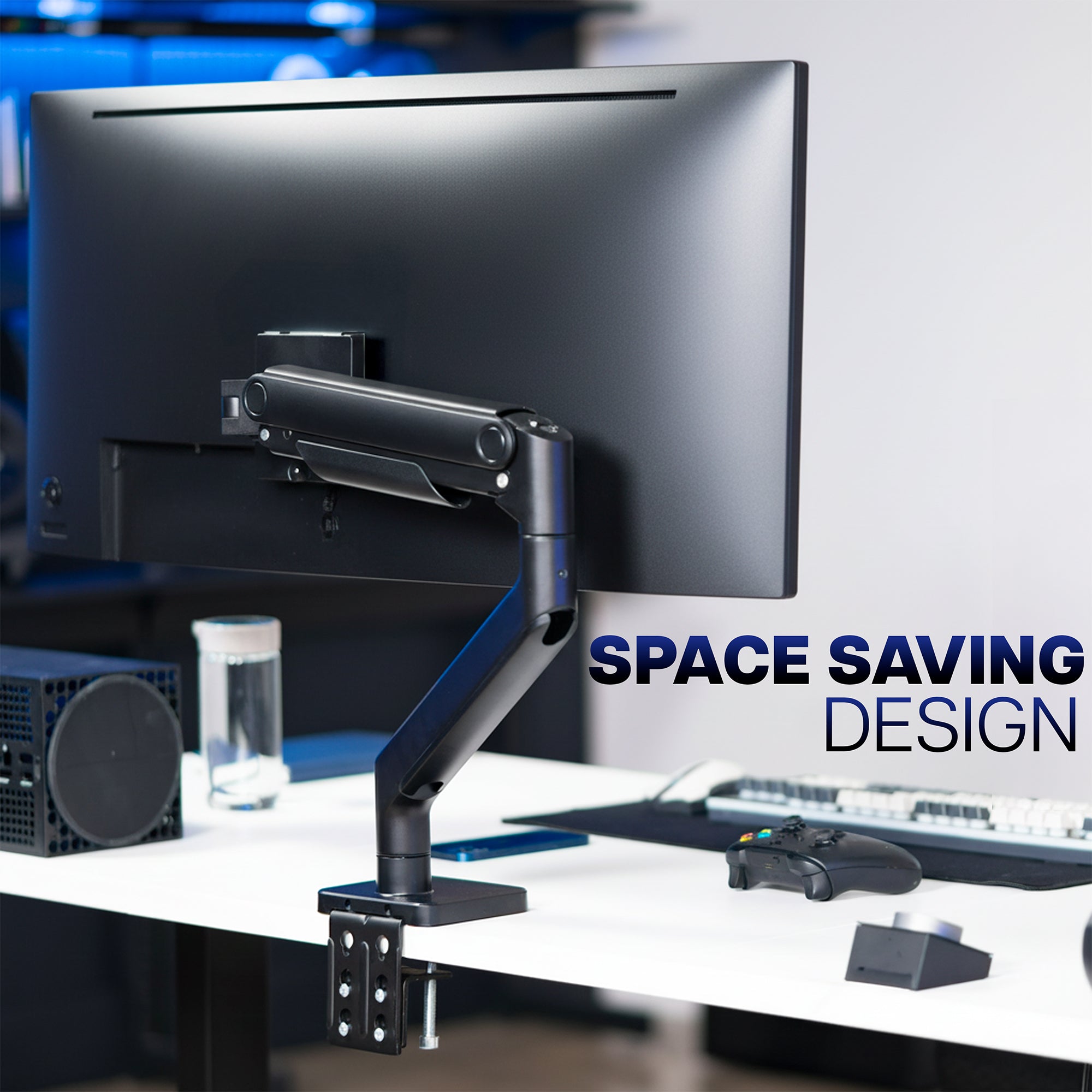 Pneumatic Arm Single Ultrawide Monitor Desk Mount on a desk, labeled 'Space Saving Design'.