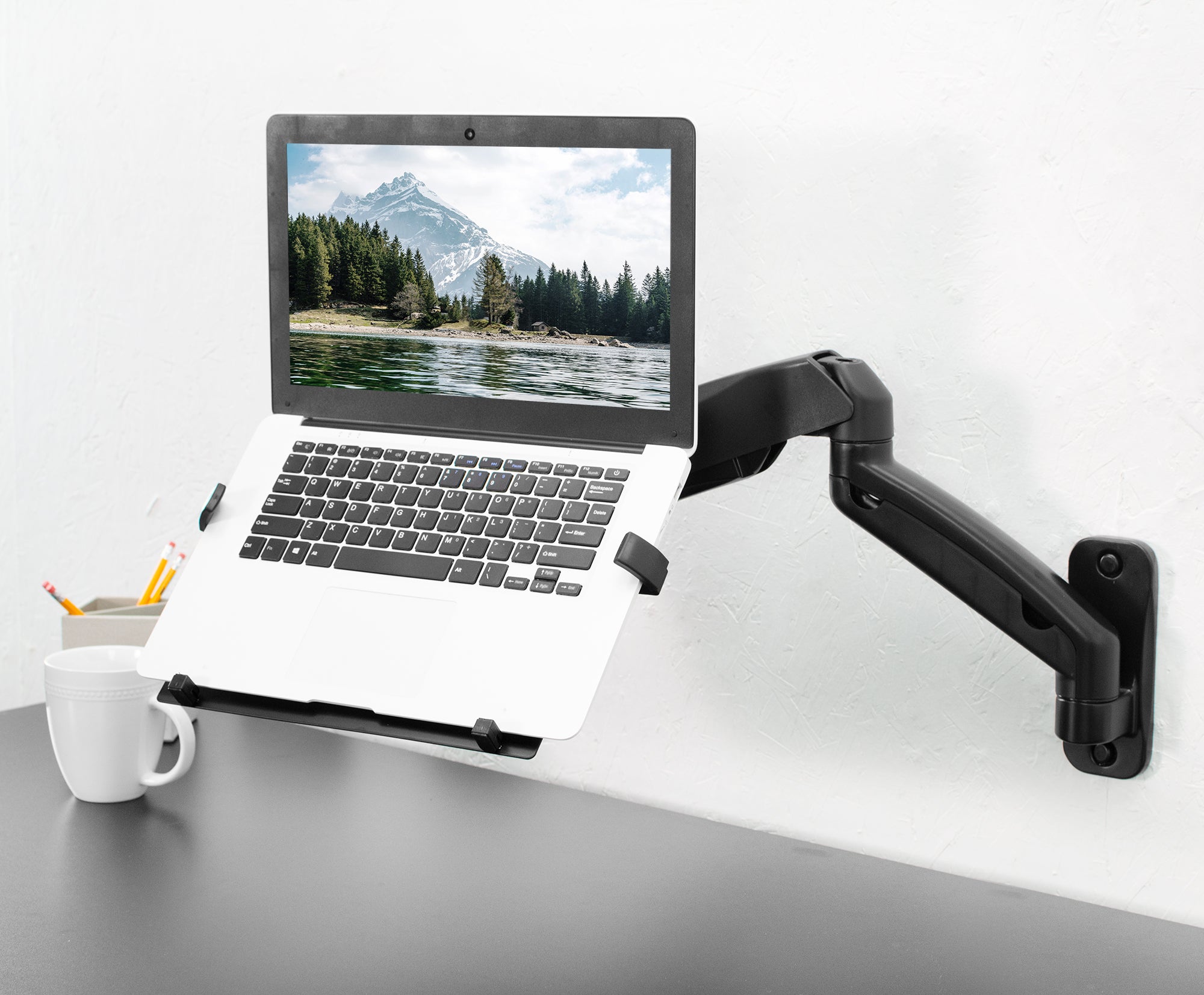 Sturdy yet adjustable pneumatic arm single monitor ergonomic wall mount.
