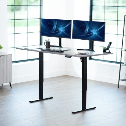 Large sturdy sit or stand modern desk with electric height adjustment options.