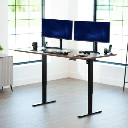 Large sturdy sit or stand modern desk with electric height adjustment options.