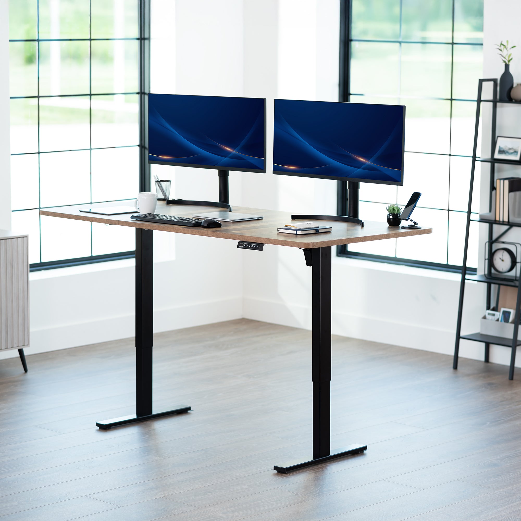 Large sturdy sit or stand modern desk with electric height adjustment options.