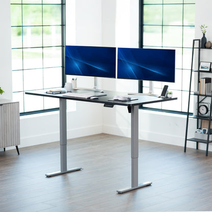 Large sturdy sit or stand modern desk with electric height adjustment options.