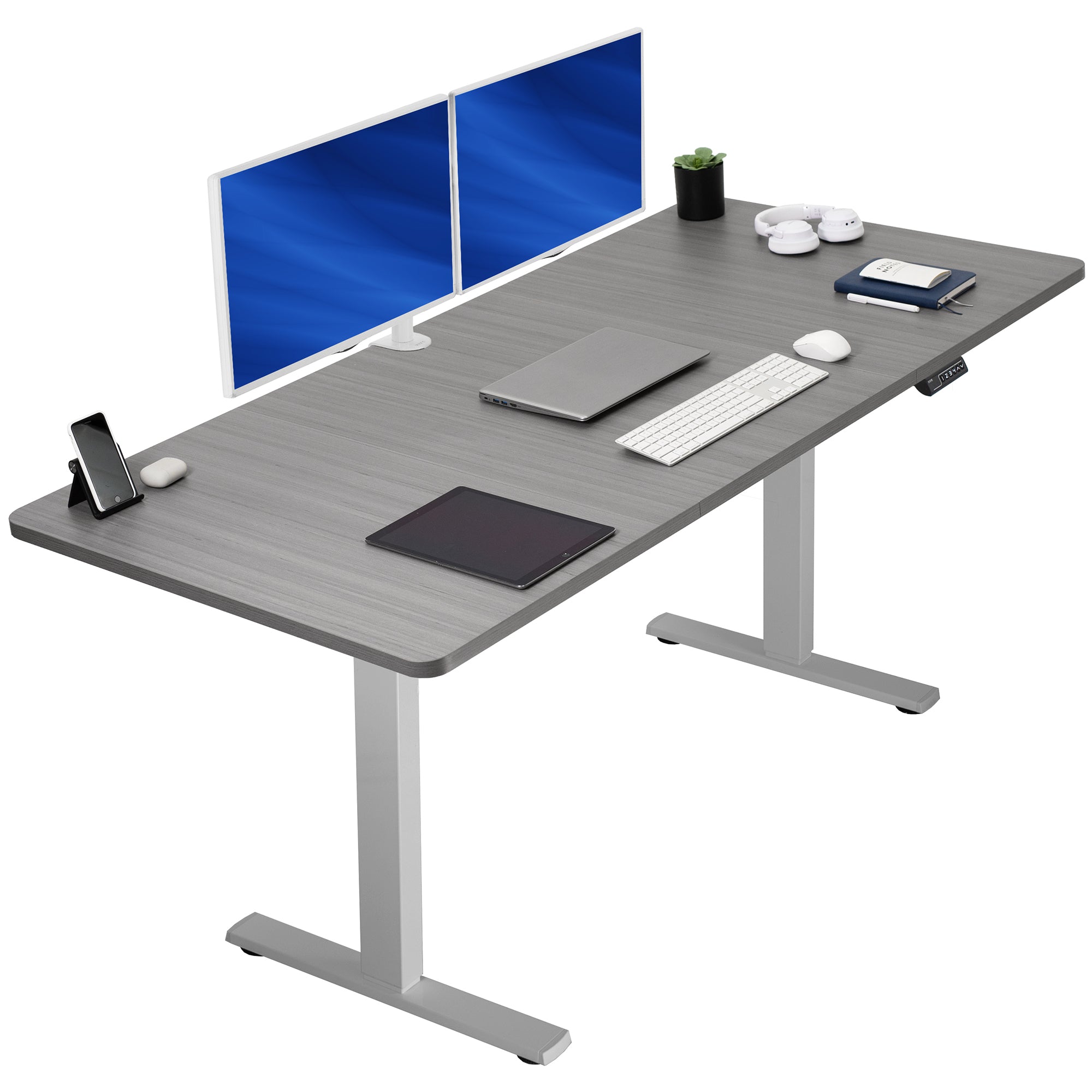 Large sturdy sit or stand modern desk with electric height adjustment options.