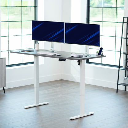 Large sturdy sit or stand modern desk with electric height adjustment options.