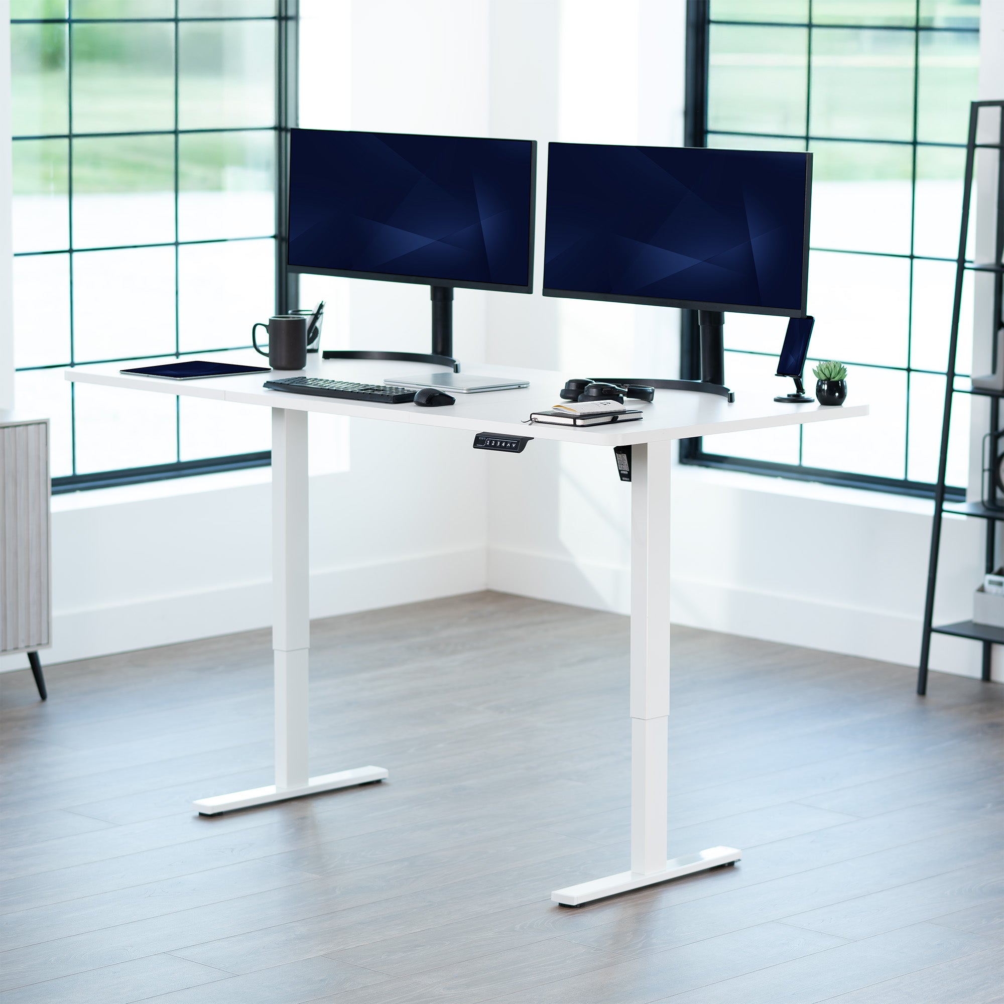 Large sturdy sit or stand modern desk with electric height adjustment options.