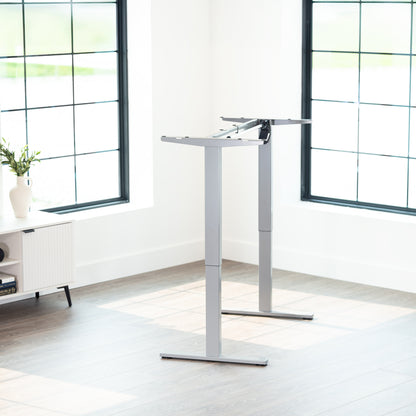 Sturdy ergonomic sit or stand desk frame for active workstation with adjustable height using smart control panel.