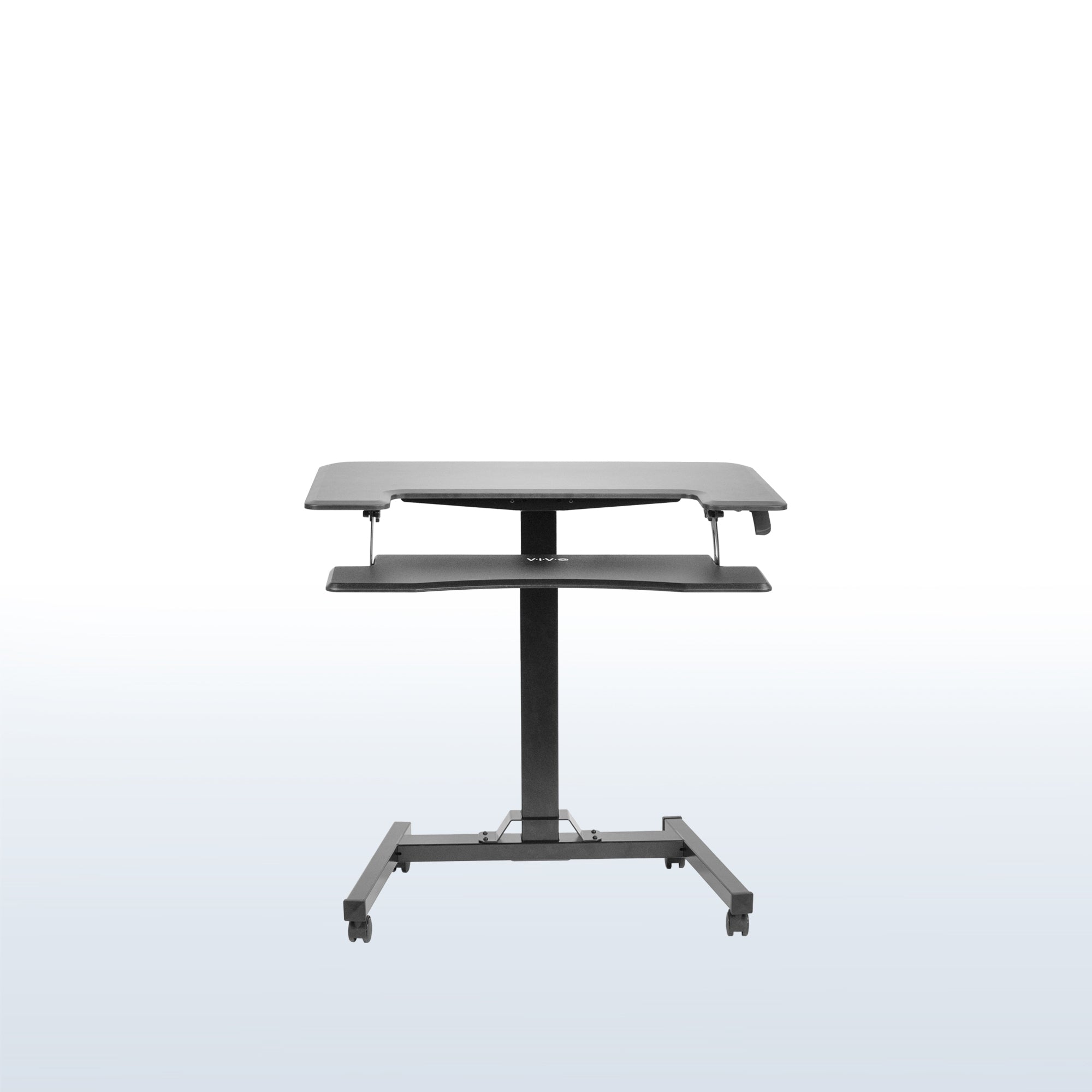 Compact mobile two-tier desk.