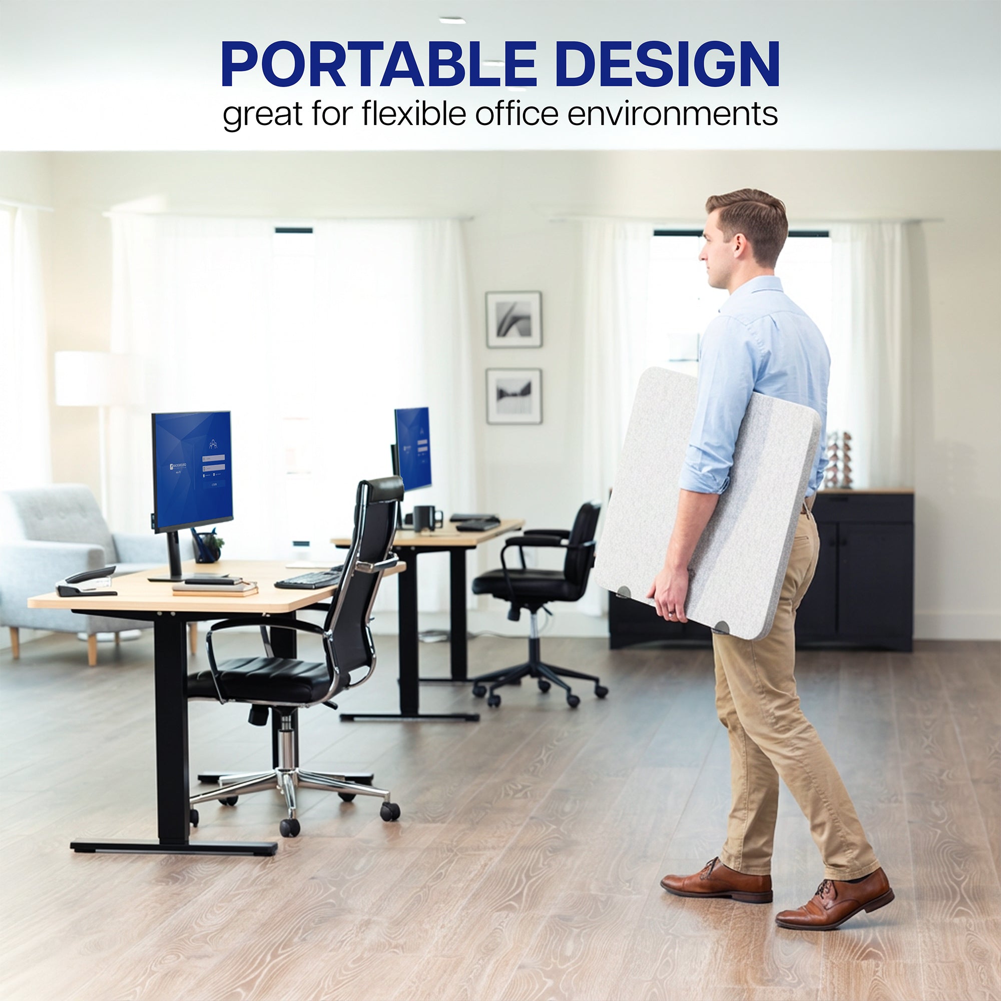 Man carrying a privacy panel in a modern office space with text 'Portable Design, great for flexible office environments'.