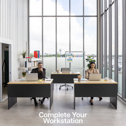 A black laminate modesty panel in a modern office workstation with a man and a woman each at a desk. 