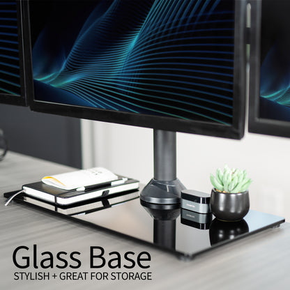 Sturdy height adjustable quad monitor desk stand.