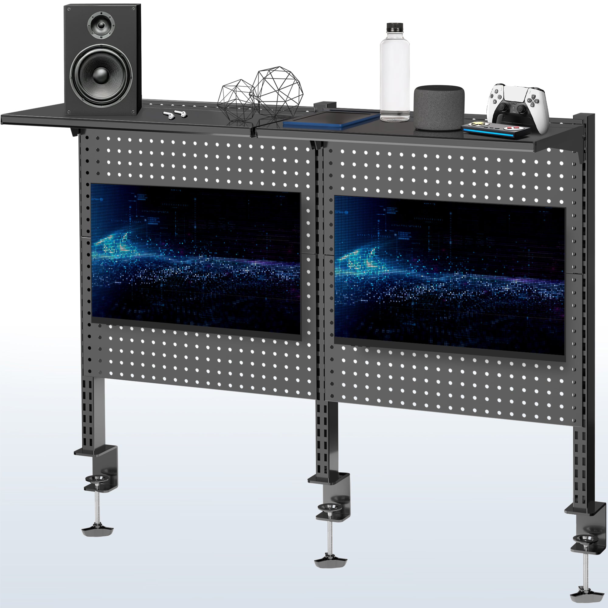 A black clamp-on pegboard monitor mount with a shelf, holding two flat-screen monitors, a speaker, and various desk accessories.